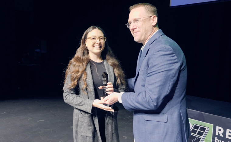 Arizona Kickoff Highlight Image of Employee Receiving an Award