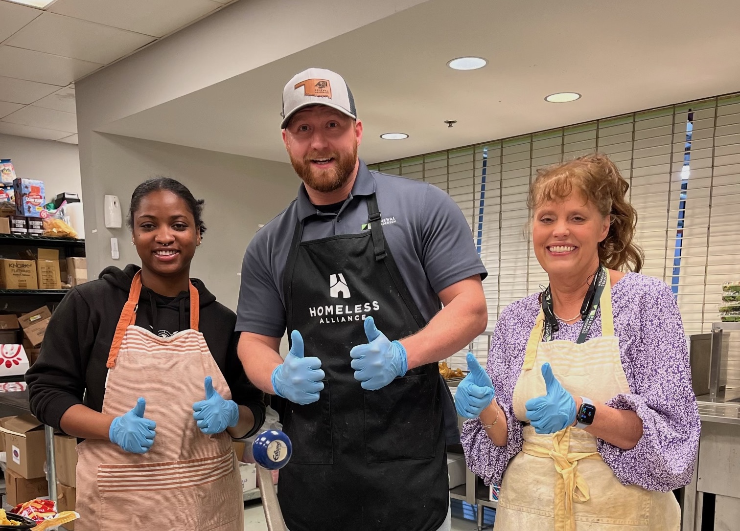Esler Companies Volunteers Serving Lunch for Homeless Alliance